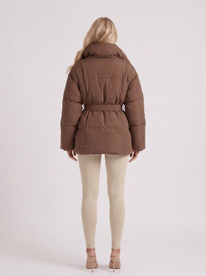 Women brown oversized padded jacket with wide portrait collar and tie waist belt, back view