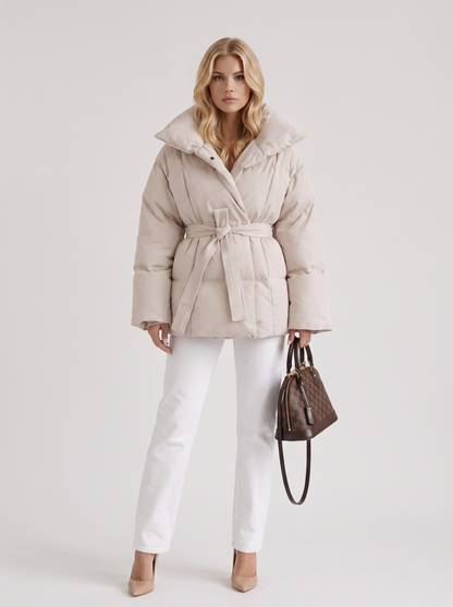 Women cream oversized padded jacket with wide portrait collar and tie waist belt, front view