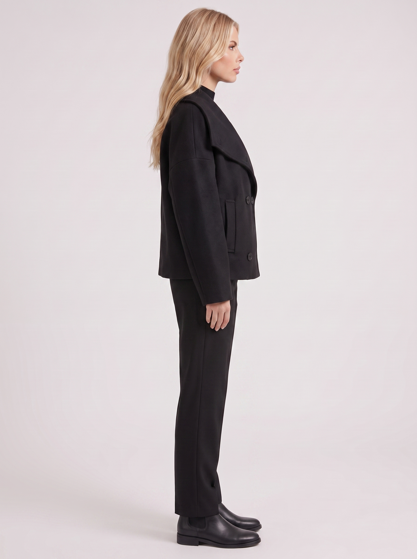 Women black oversized double breasted wool blend peacoat with wide notch collar, side view