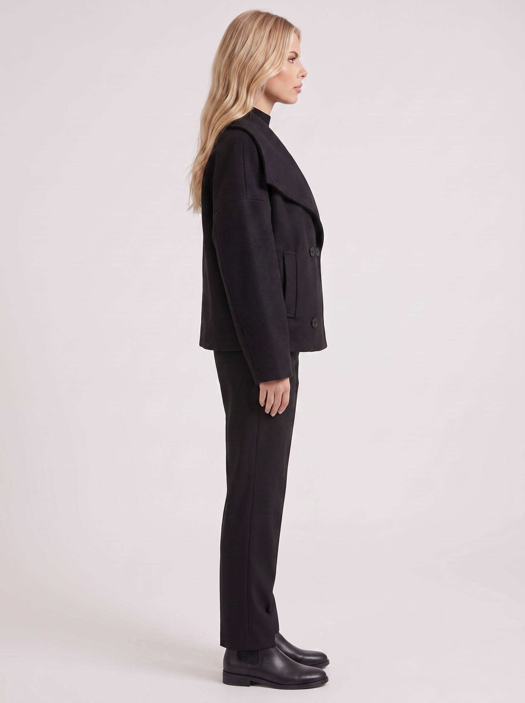 Women black oversized double breasted wool blend peacoat with wide notch collar, side view