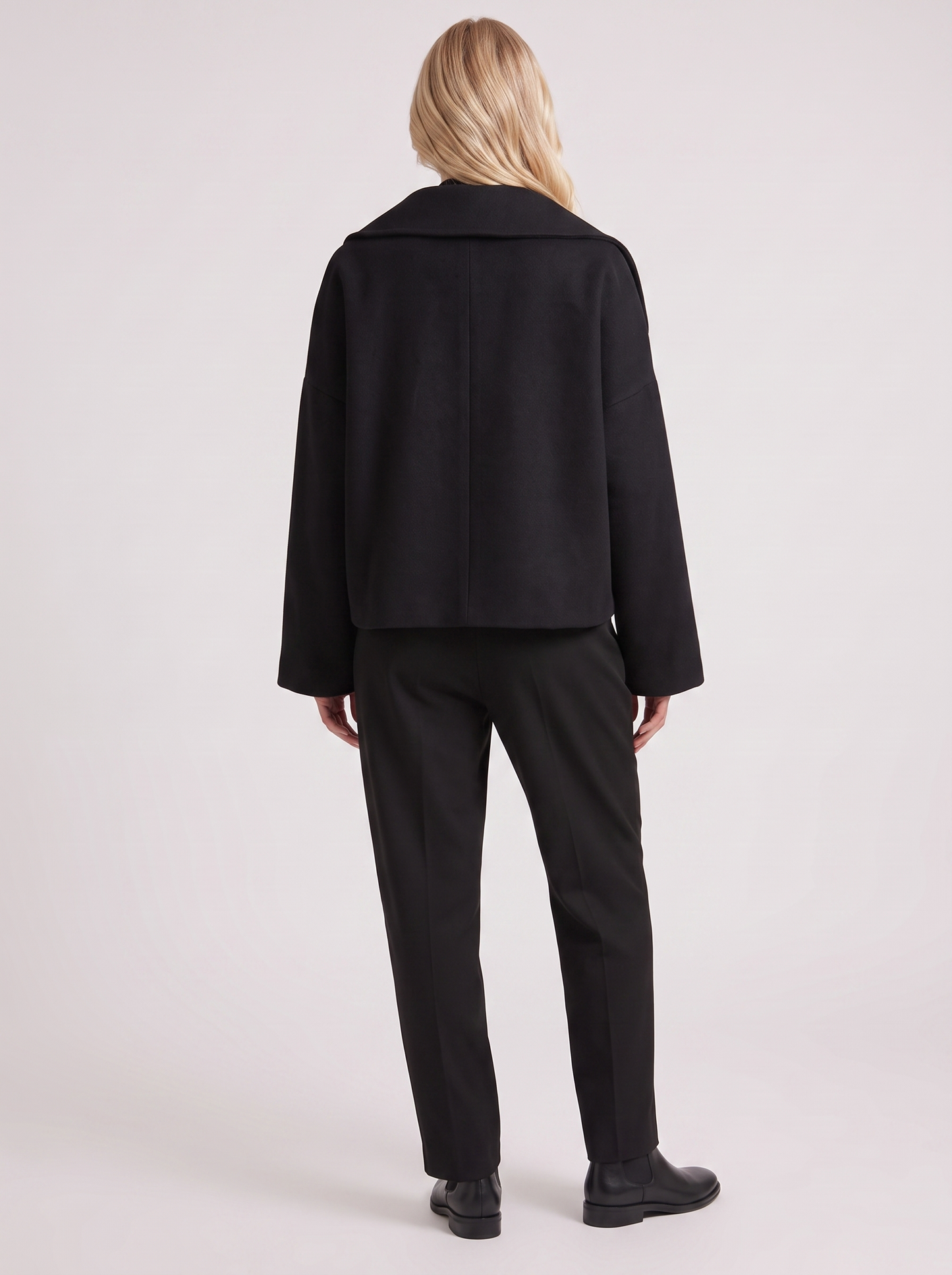 Women black oversized double breasted wool blend peacoat with wide notch collar, back view