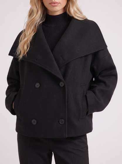 Women black oversized double breasted wool blend peacoat with wide notch collar, fabric closeup