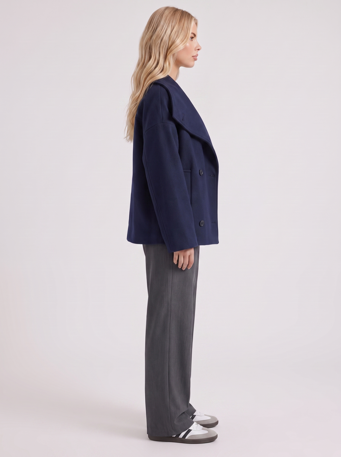 Women navy oversized double breasted wool blend peacoat with wide notch collar, side view