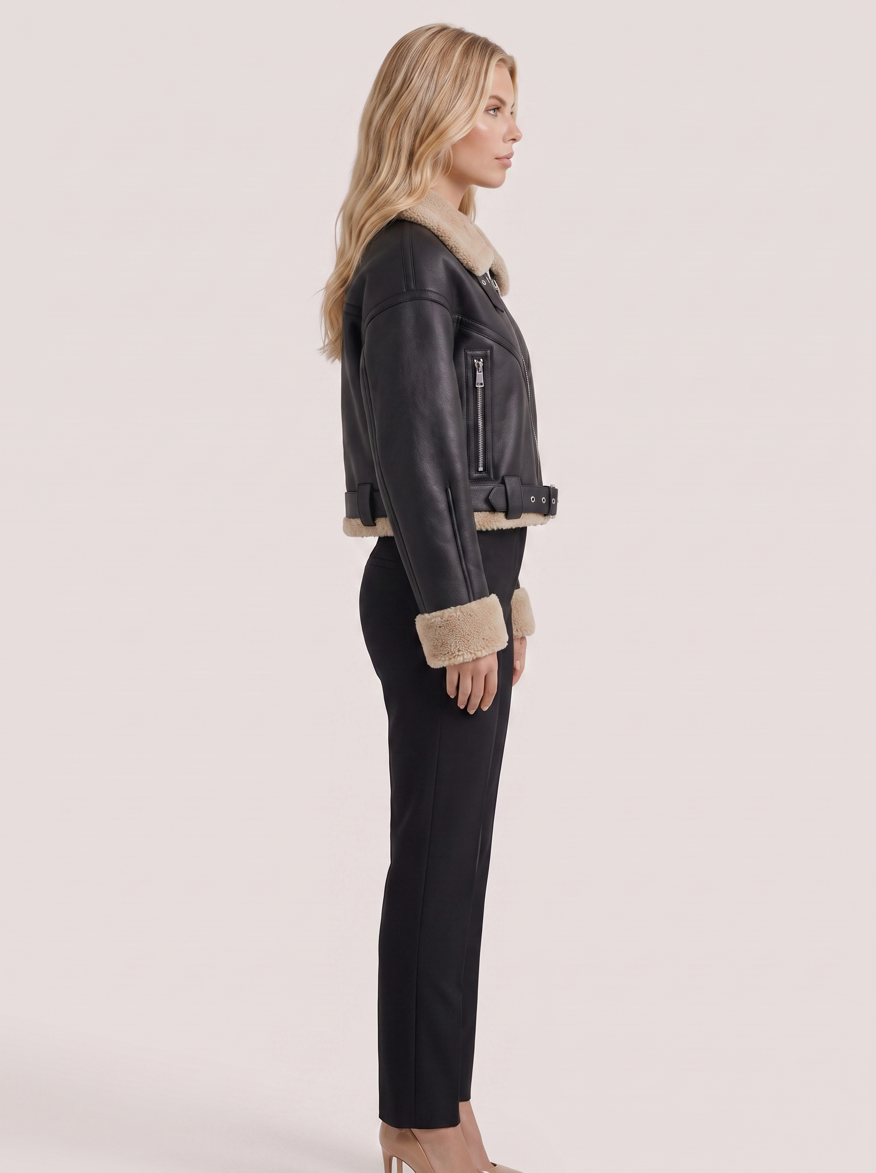 Women black cropped faux leather aviator jacket with faux shearling collar and belt, side view