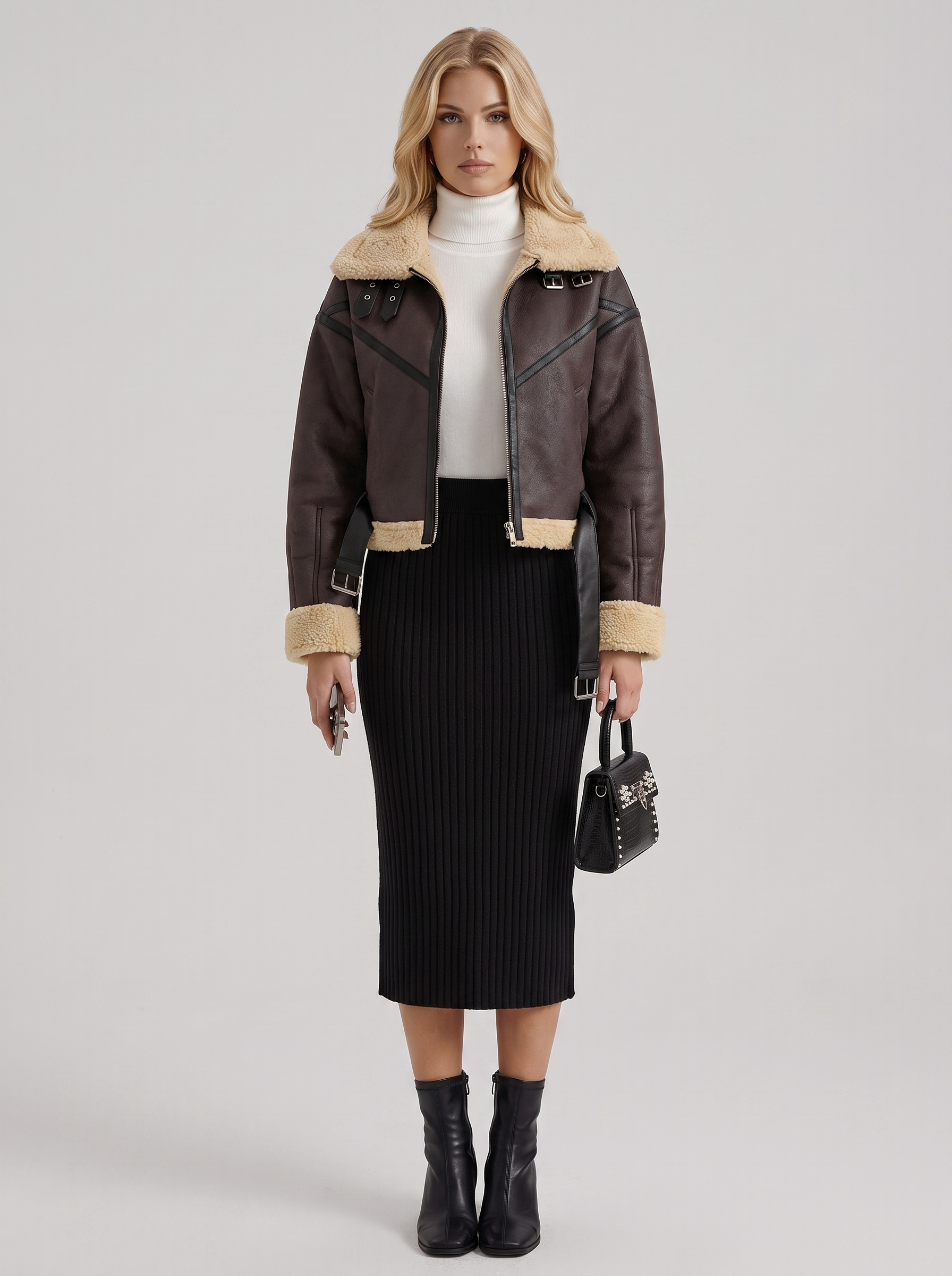 Women brown cropped faux leather aviator jacket with faux shearling collar and belt, front view