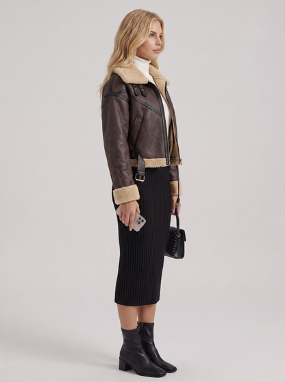Women brown cropped faux leather aviator jacket with faux shearling collar and belt, side view