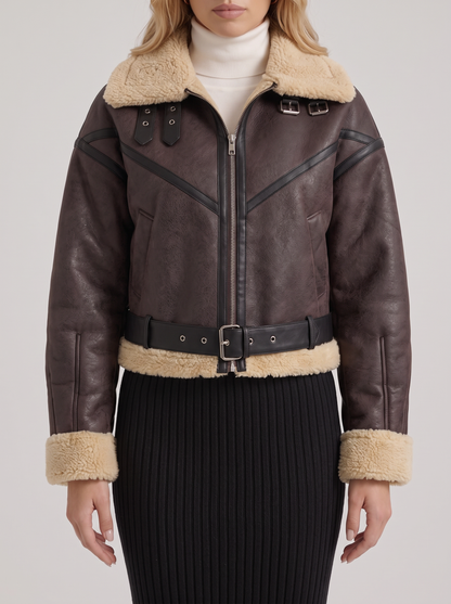 Women brown cropped faux leather aviator jacket with faux shearling collar and belt, fabric closeup