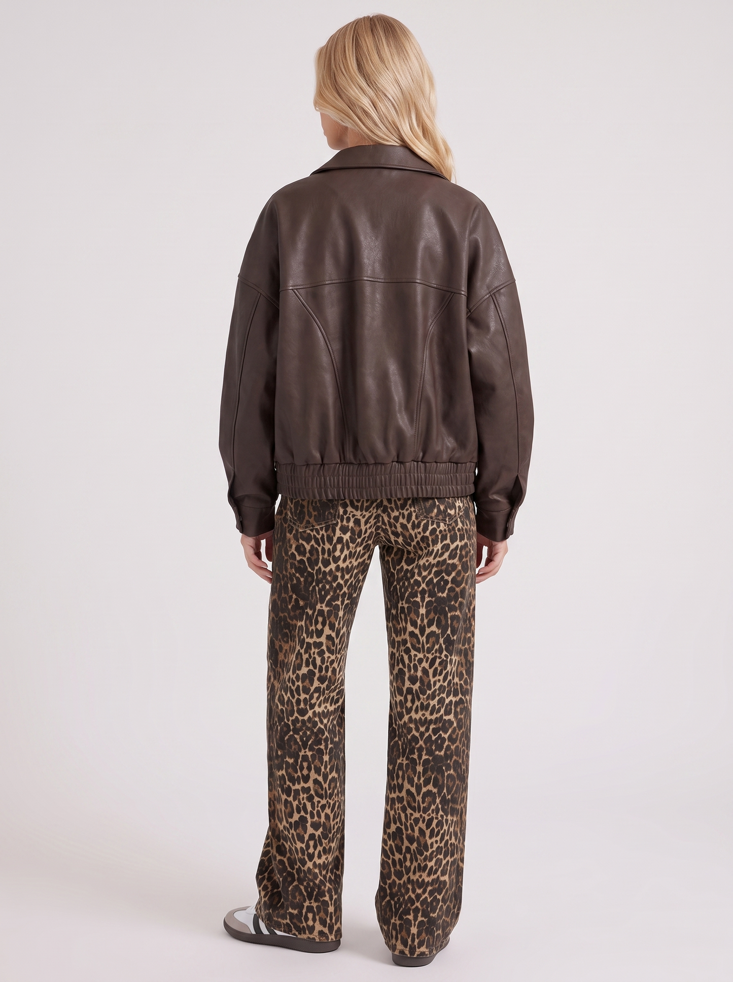 Women brown oversized faux leather bomber jacket with point collar and snap placket, back view