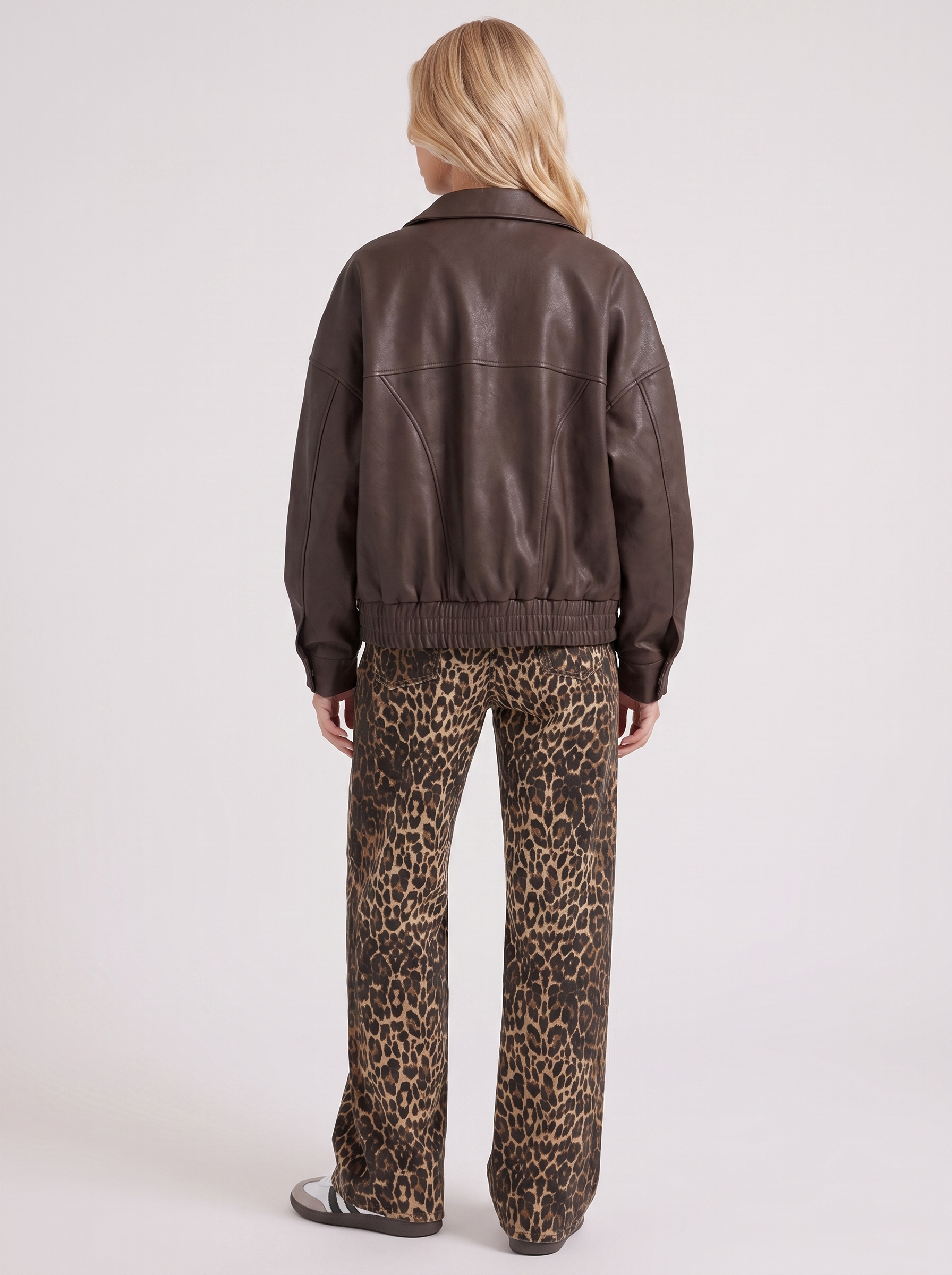 Women brown oversized faux leather bomber jacket with point collar and snap placket, back view