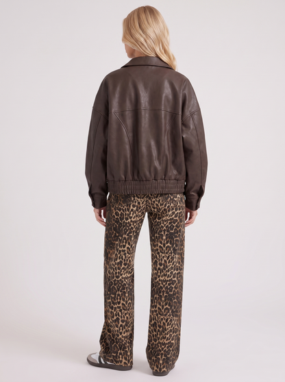 Women brown oversized faux leather bomber jacket with point collar and snap placket, back view