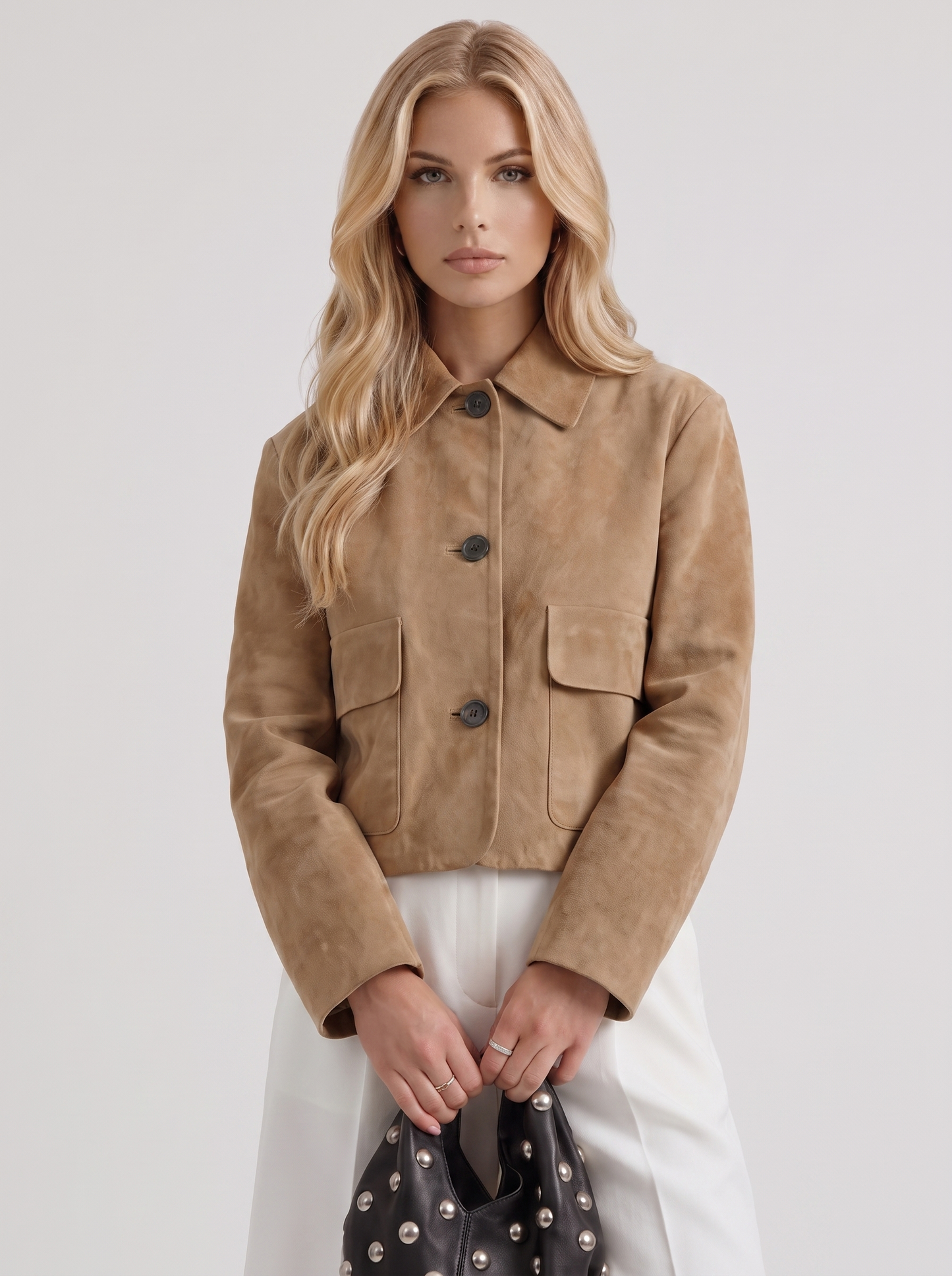 Women camel cropped faux suede jacket with point collar and two flap pockets, front detail