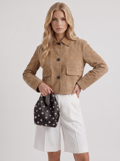 Women camel cropped faux suede jacket with point collar and two flap pockets, three quarter view