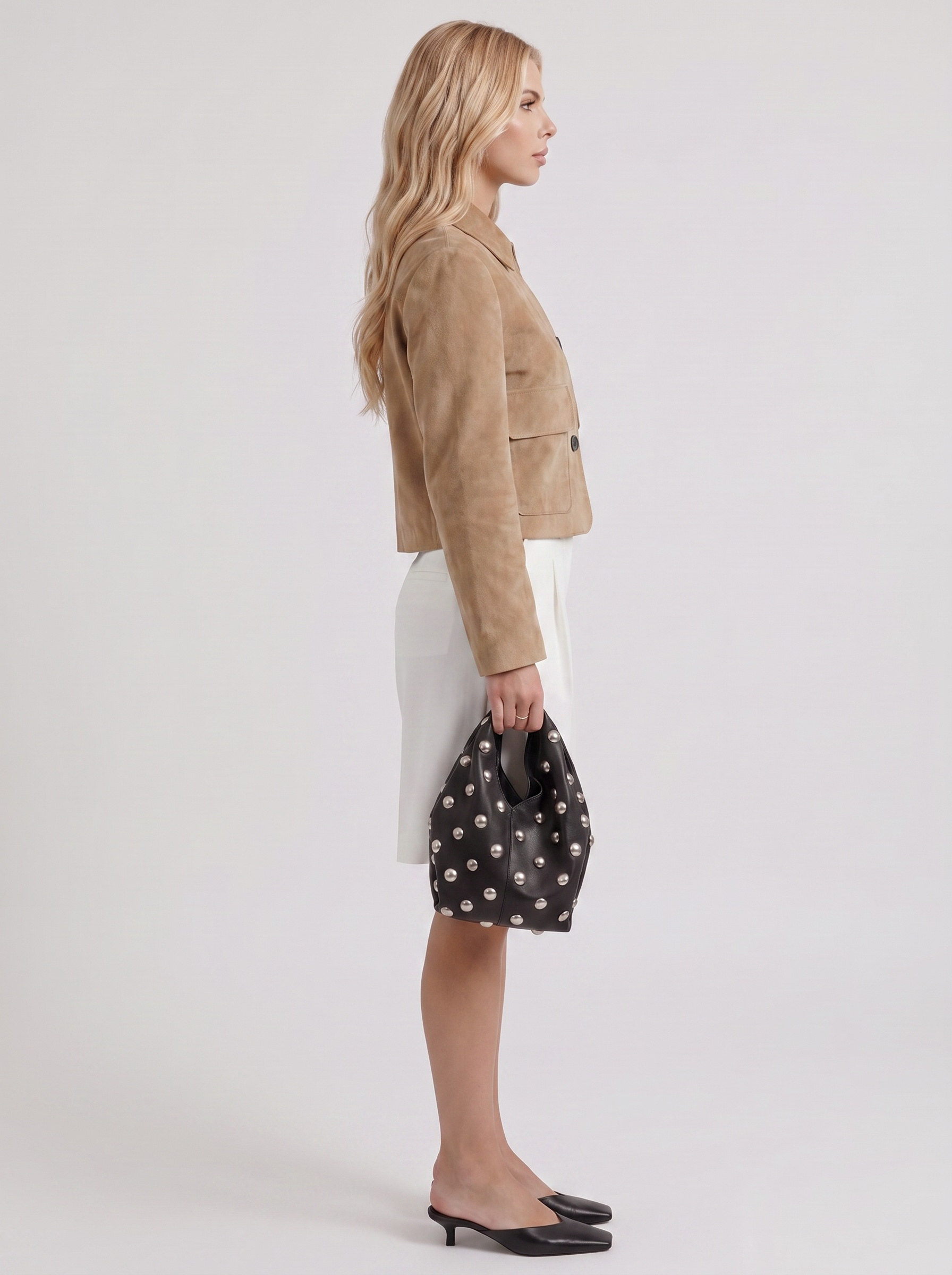 Women camel cropped faux suede jacket with point collar and two flap pockets, side view