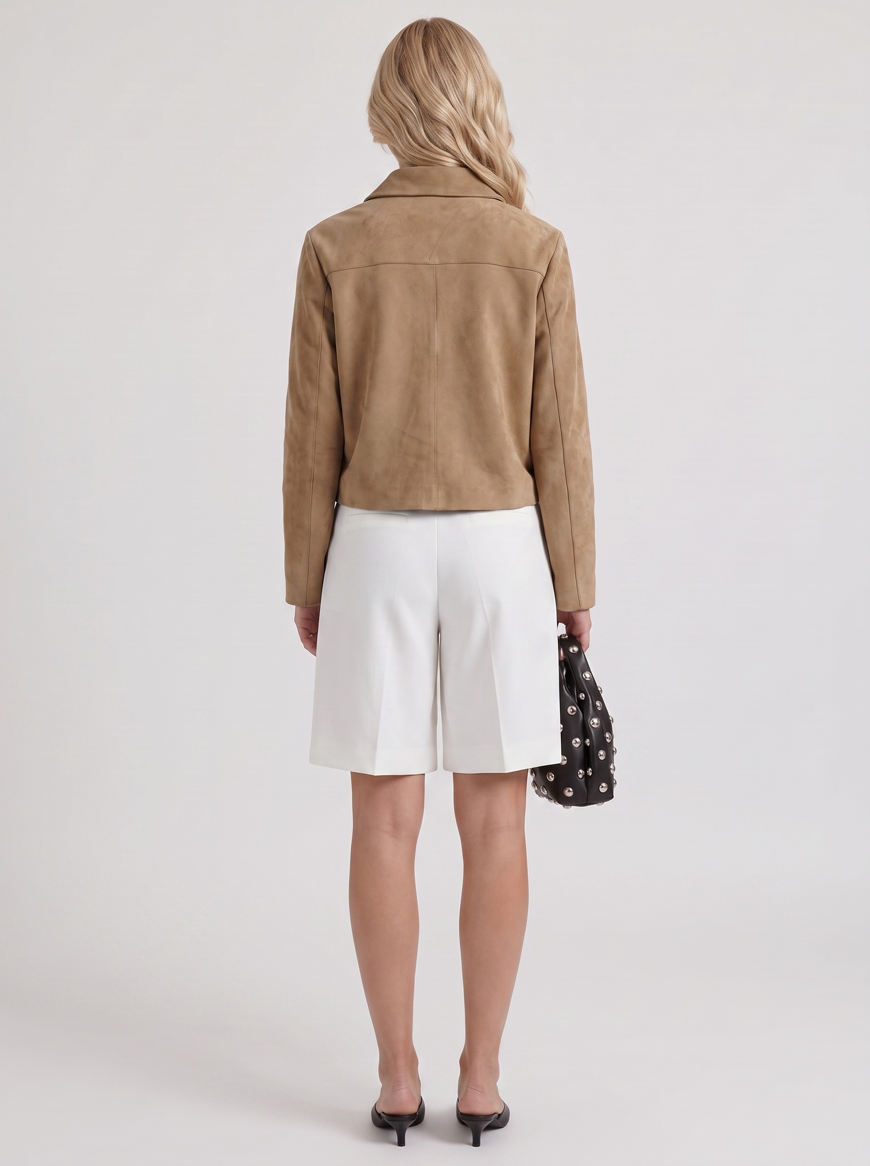Women camel cropped faux suede jacket with point collar and two flap pockets, back view