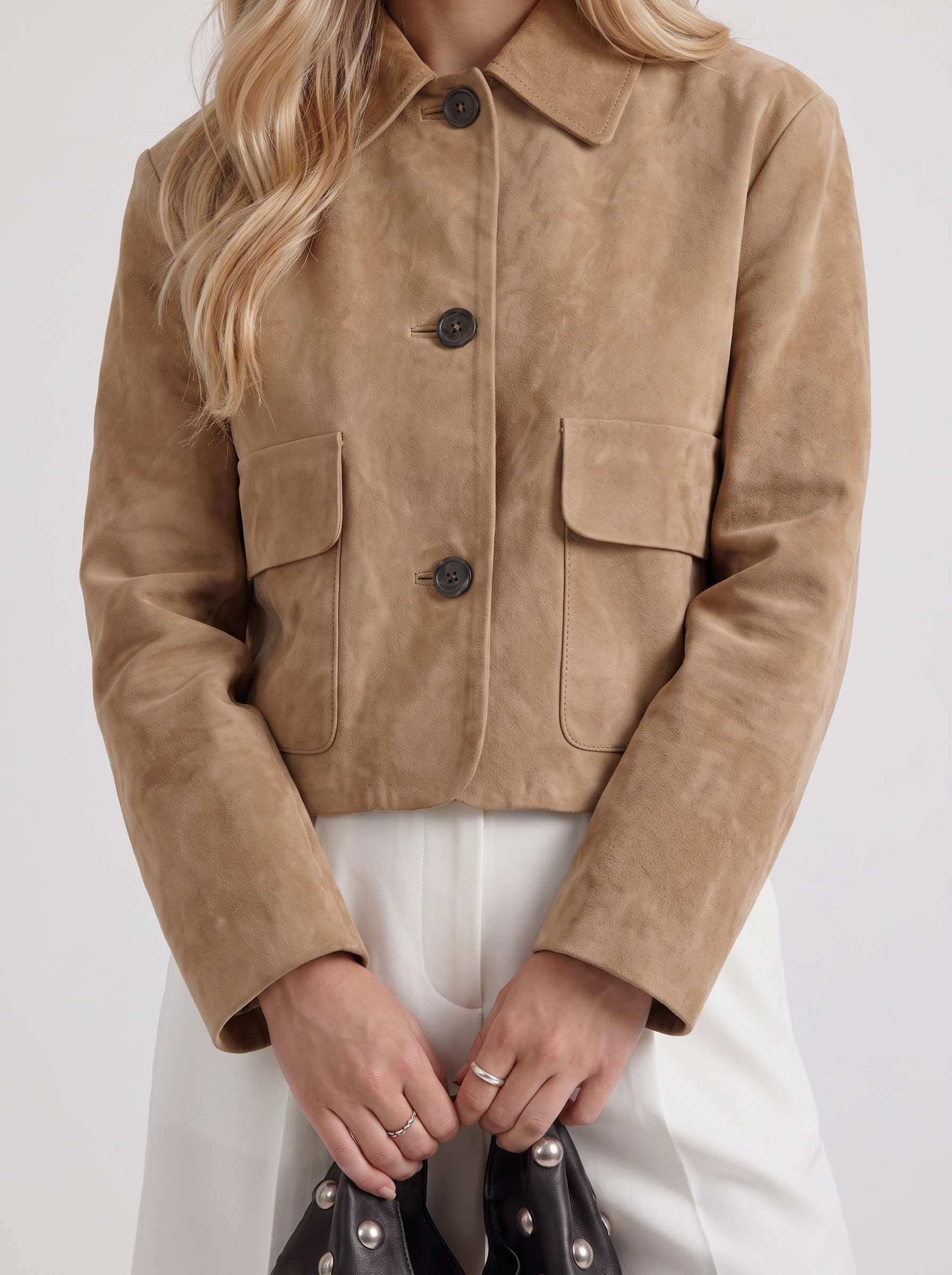 Women camel cropped faux suede jacket with point collar and two flap pockets, fabric closeup