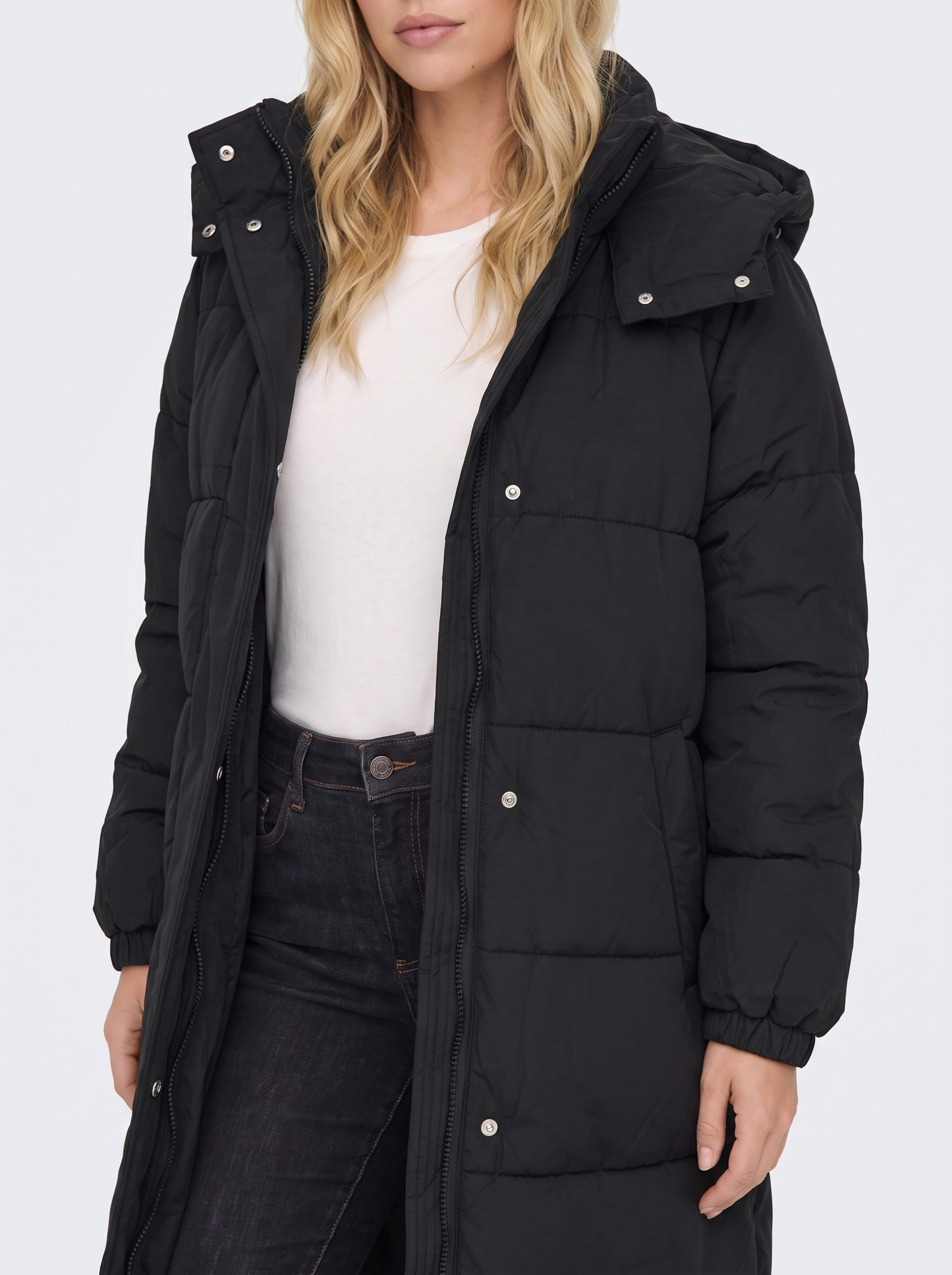 Women black longline hooded puffer coat with horizontal quilting and zip front, fabric closeup