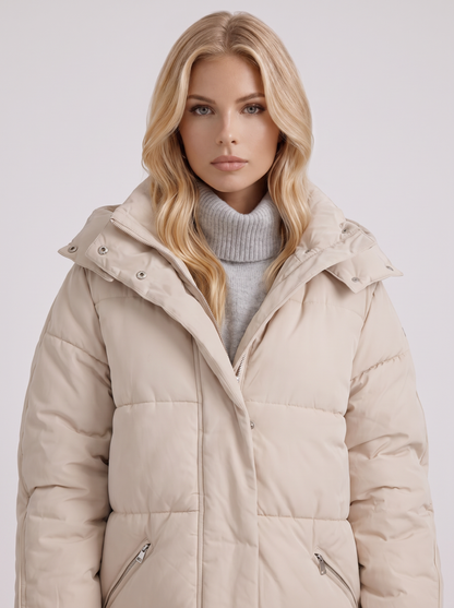 Women brown longline hooded puffer coat with horizontal quilting and zip front, front detail