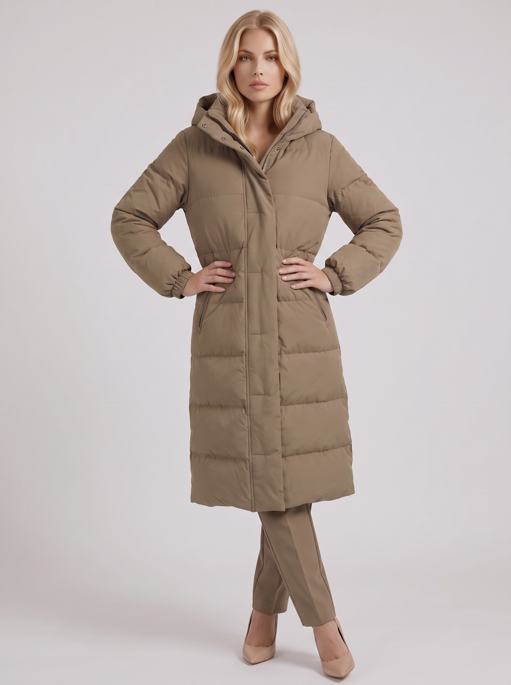 Women white longline hooded puffer coat with horizontal quilting and zip front, three quarter view