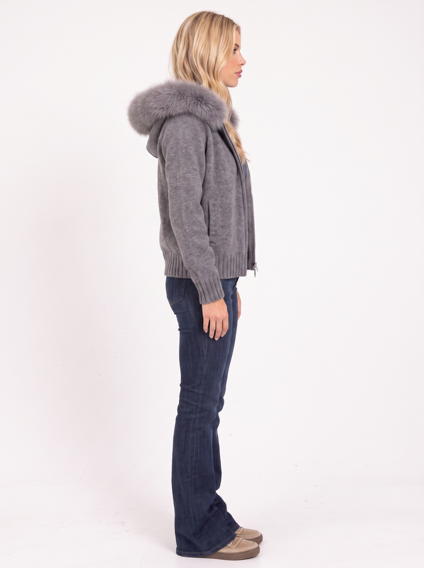 Women gray hooded rib knit cardigan with faux fur pompom ties and open front, side view