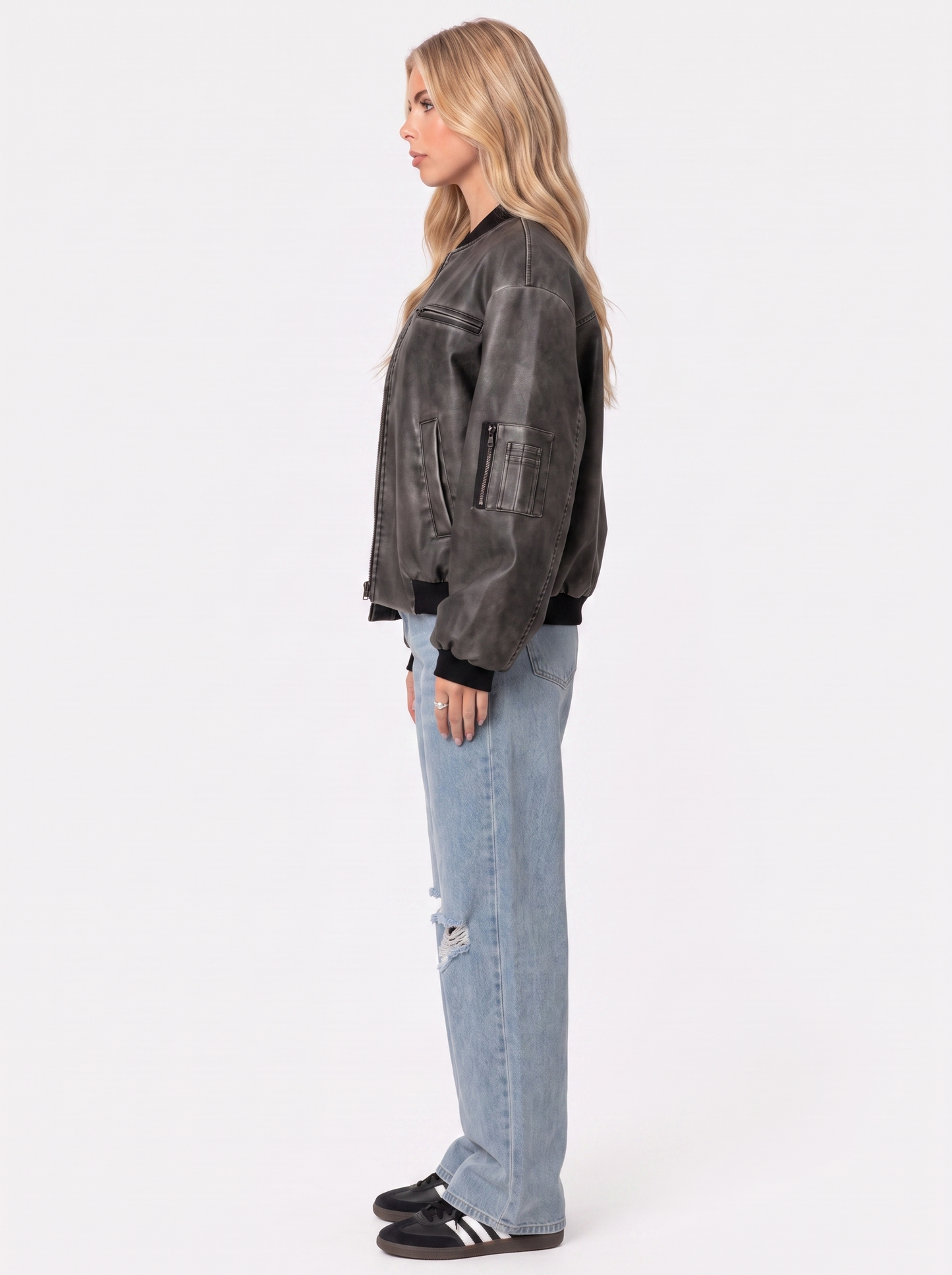 Women gray oversized washed faux leather bomber jacket with zip and utility pockets, side view