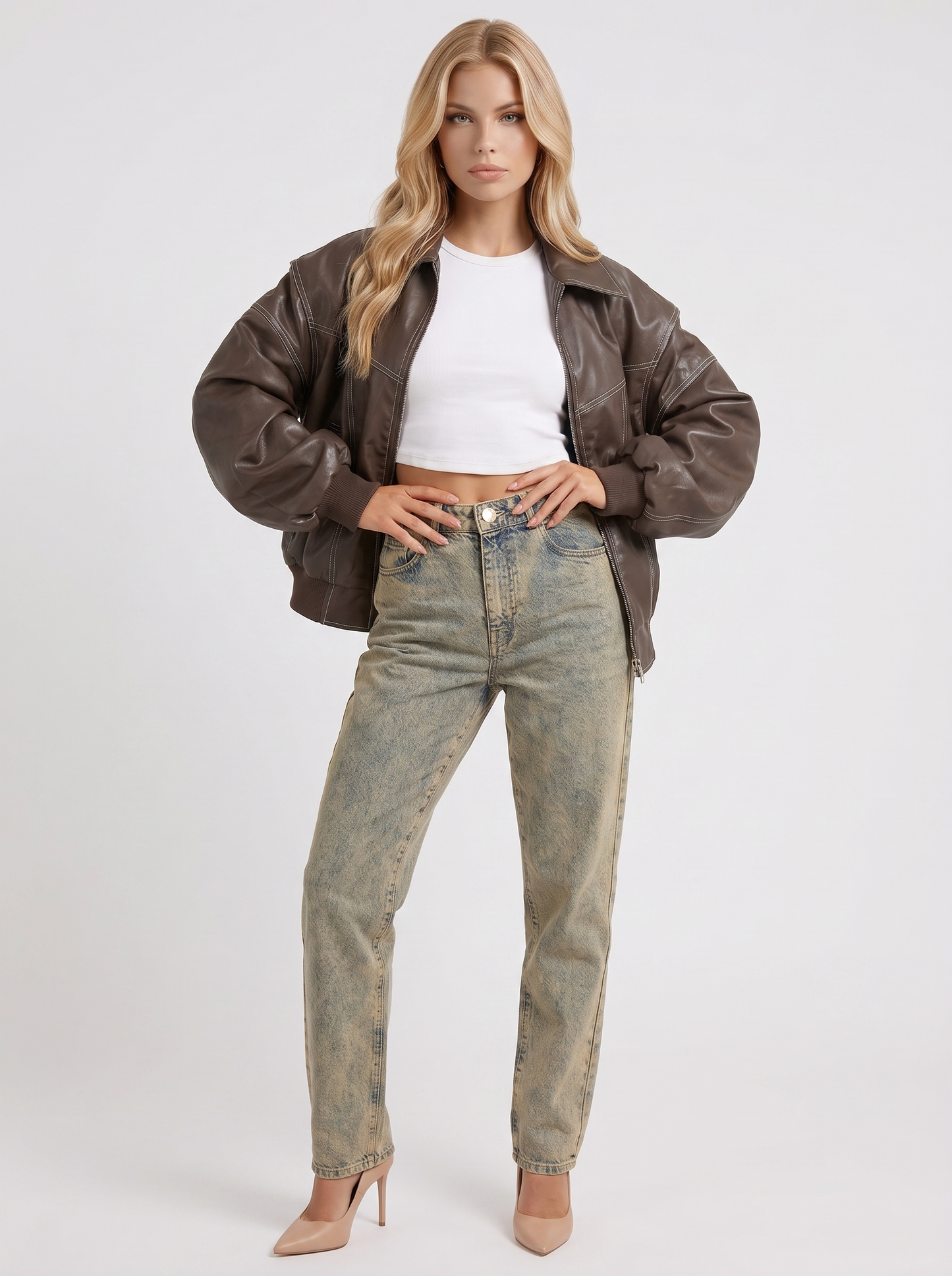 Women brown oversized distressed faux leather bomber jacket with contrast topstitching, three quarter view