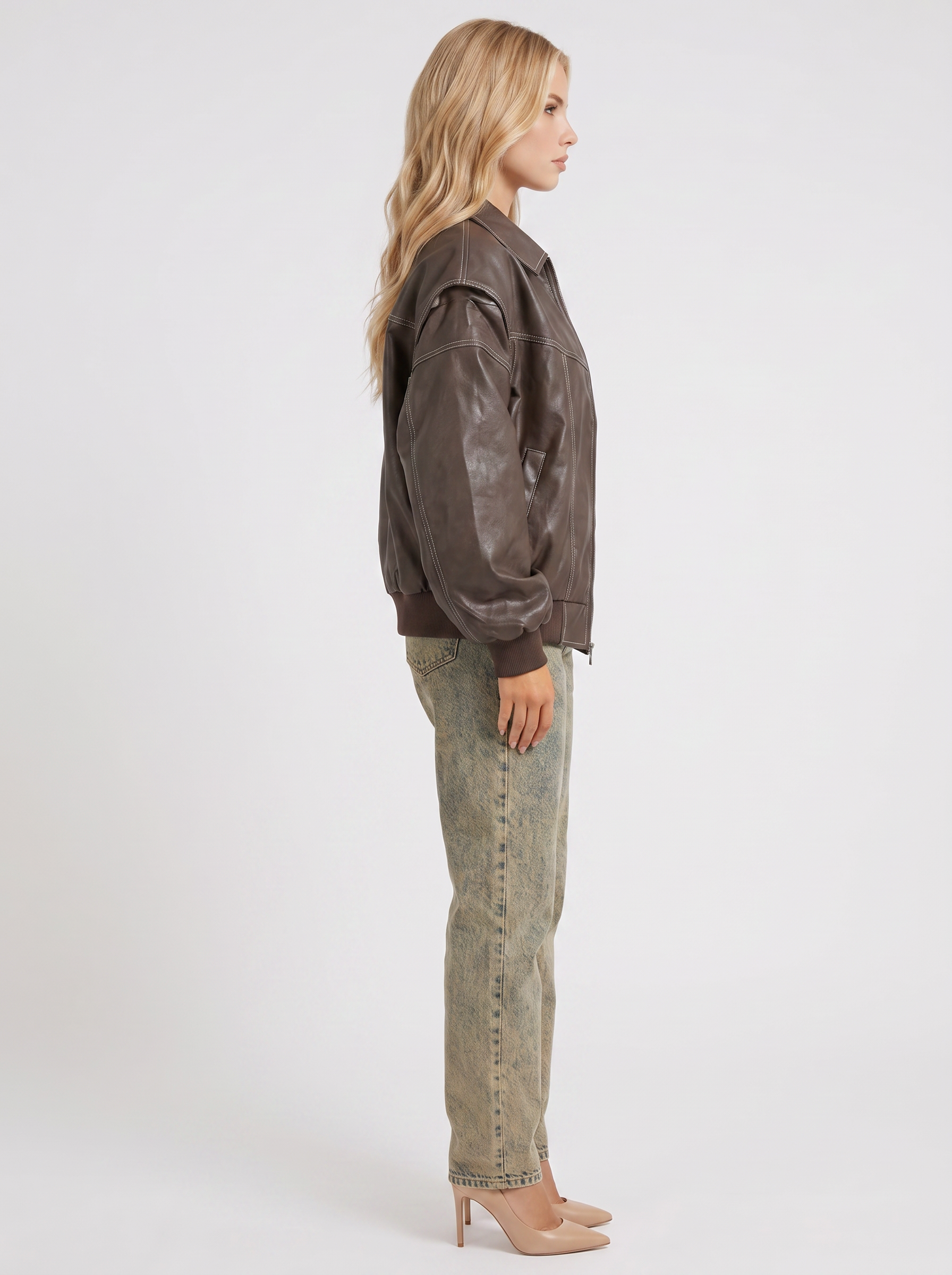 Women brown oversized distressed faux leather bomber jacket with contrast topstitching, side view