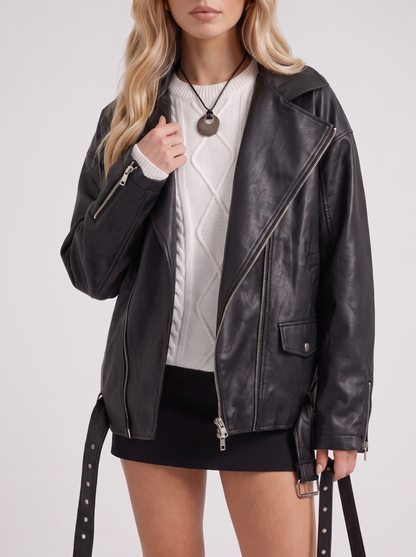 Women black oversized faux leather biker jacket with asymmetric zip and studded belt, fabric closeup