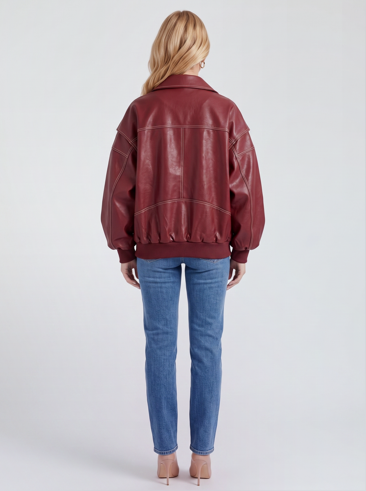 Women red oversized leather look bomber jacket shown from the back