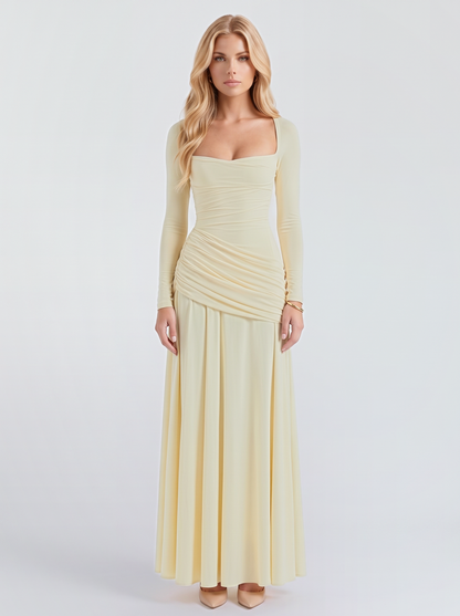 Women cream long sleeve ruched maxi dress with a square neckline and a draped hip, front view