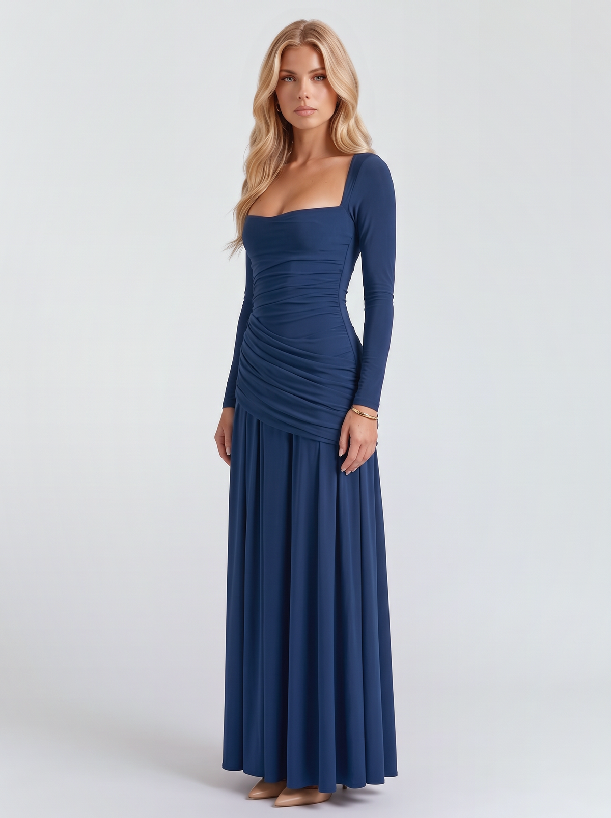 Women navy long sleeve ruched maxi dress with a draped hip and a flowing skirt, three quarter view