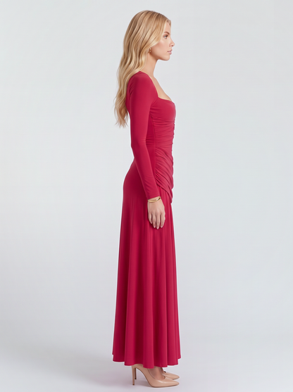 Women red long sleeve ruched maxi dress with a fitted bodice and a flowing skirt, side view