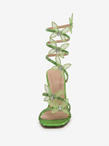 Women green heeled sandals with wrap straps and butterfly detail