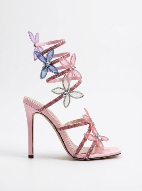 Women pink heeled sandals with wrap straps and butterfly detail