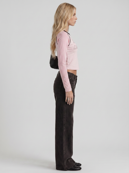 Women black wide leg bow detail jeans, side profile view