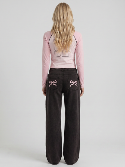 Women black wide leg bow detail jeans, back view