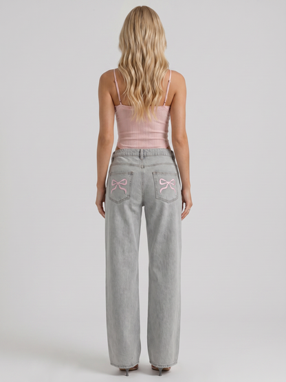 Women blue wide leg bow detail jeans, back view