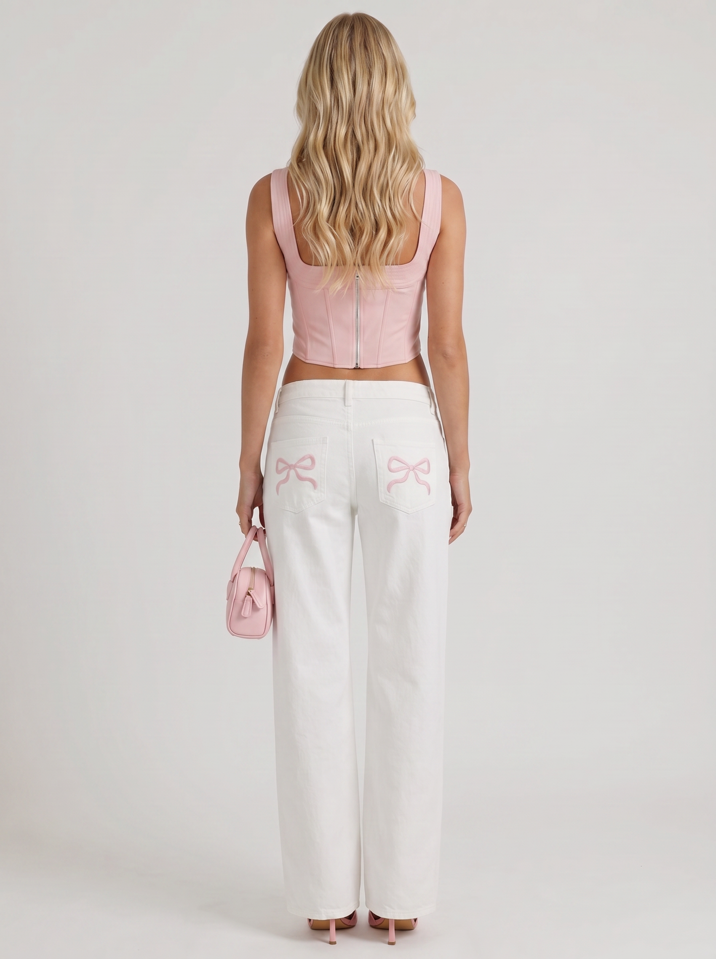 Women white wide leg bow detail jeans, back view