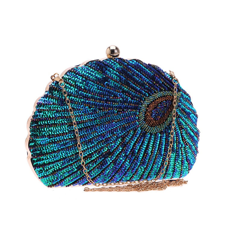 Women blue clutch bag with sequin finish and beaded detail
