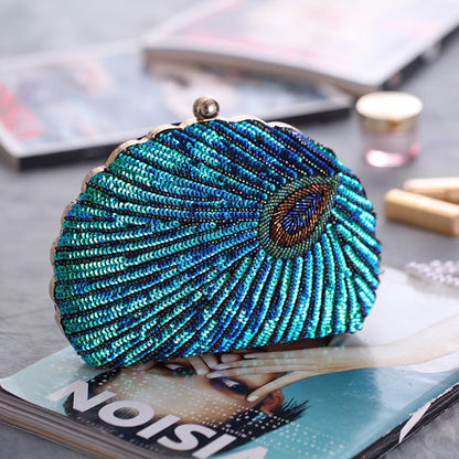 Women blue clutch bag with sequin finish and beaded detail