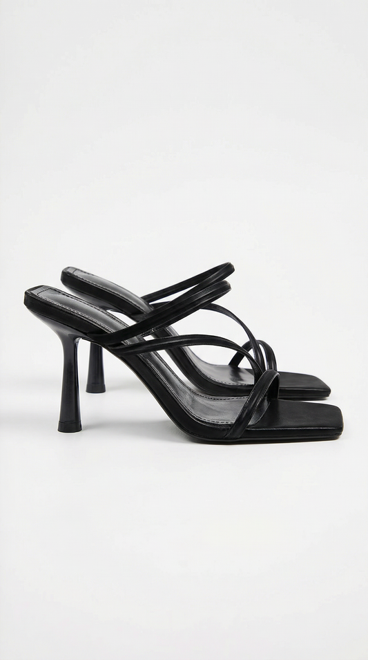 Women black heeled sandals with square toe and cross straps