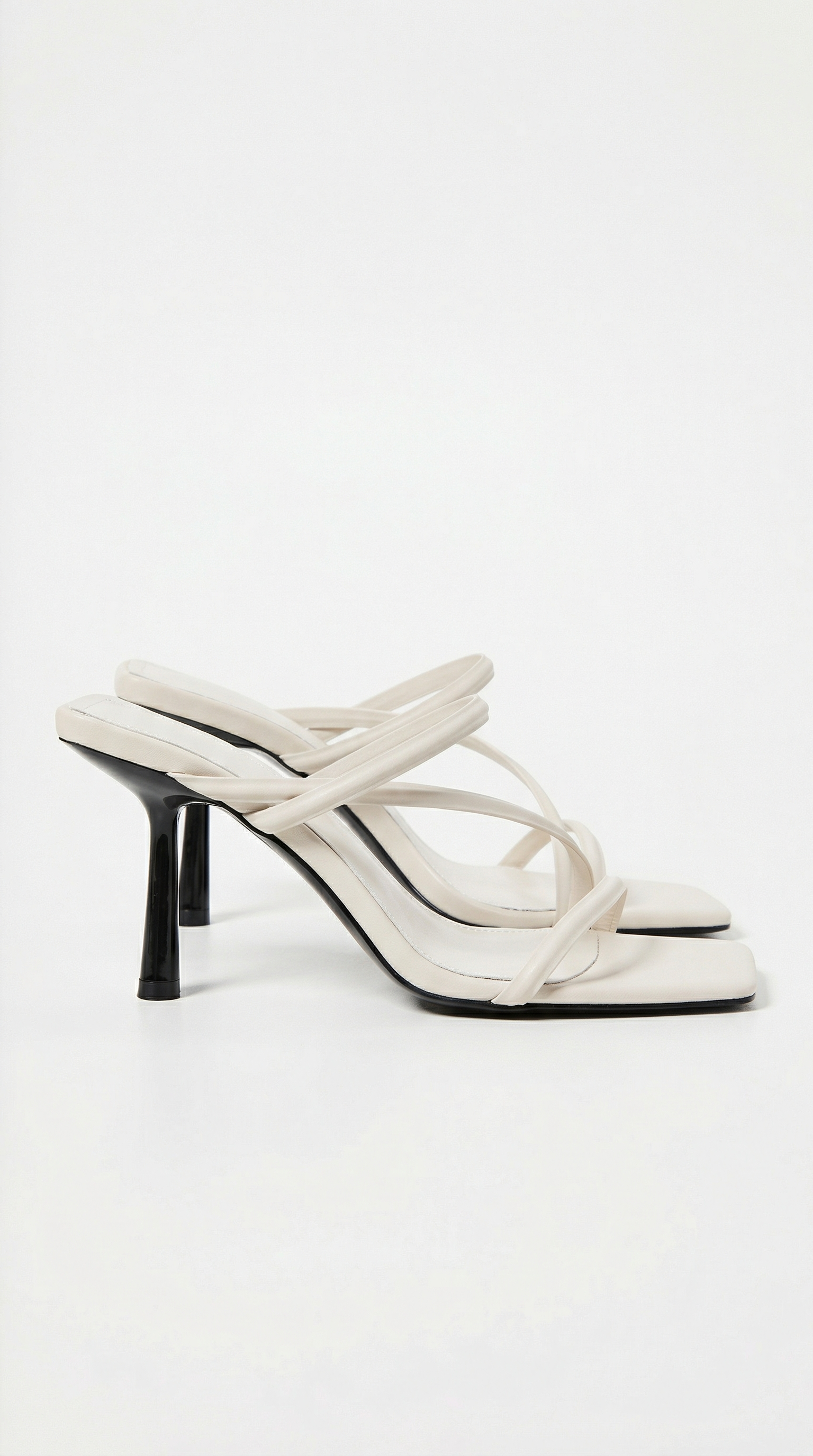 Women cream heeled sandals with square toe and cross straps