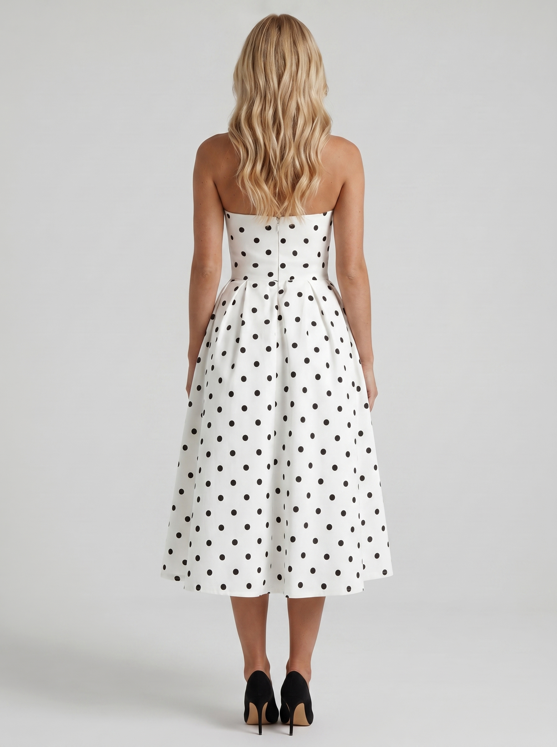 Women black polka dot strapless pleated midi dress with open back, back view