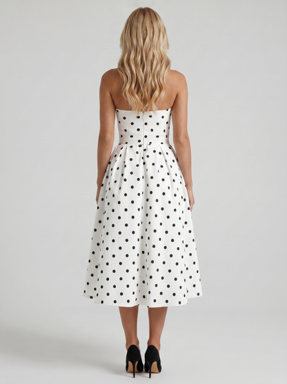 Women black polka dot strapless pleated midi dress with open back, back view