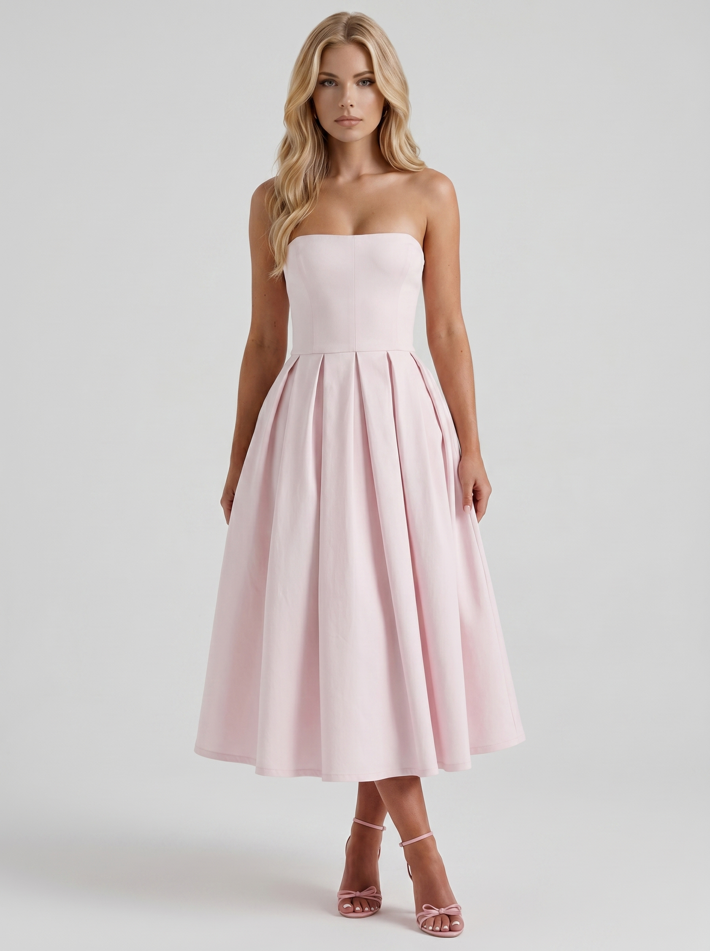 Women blush strapless pleated A line midi dress with fitted bodice, front view