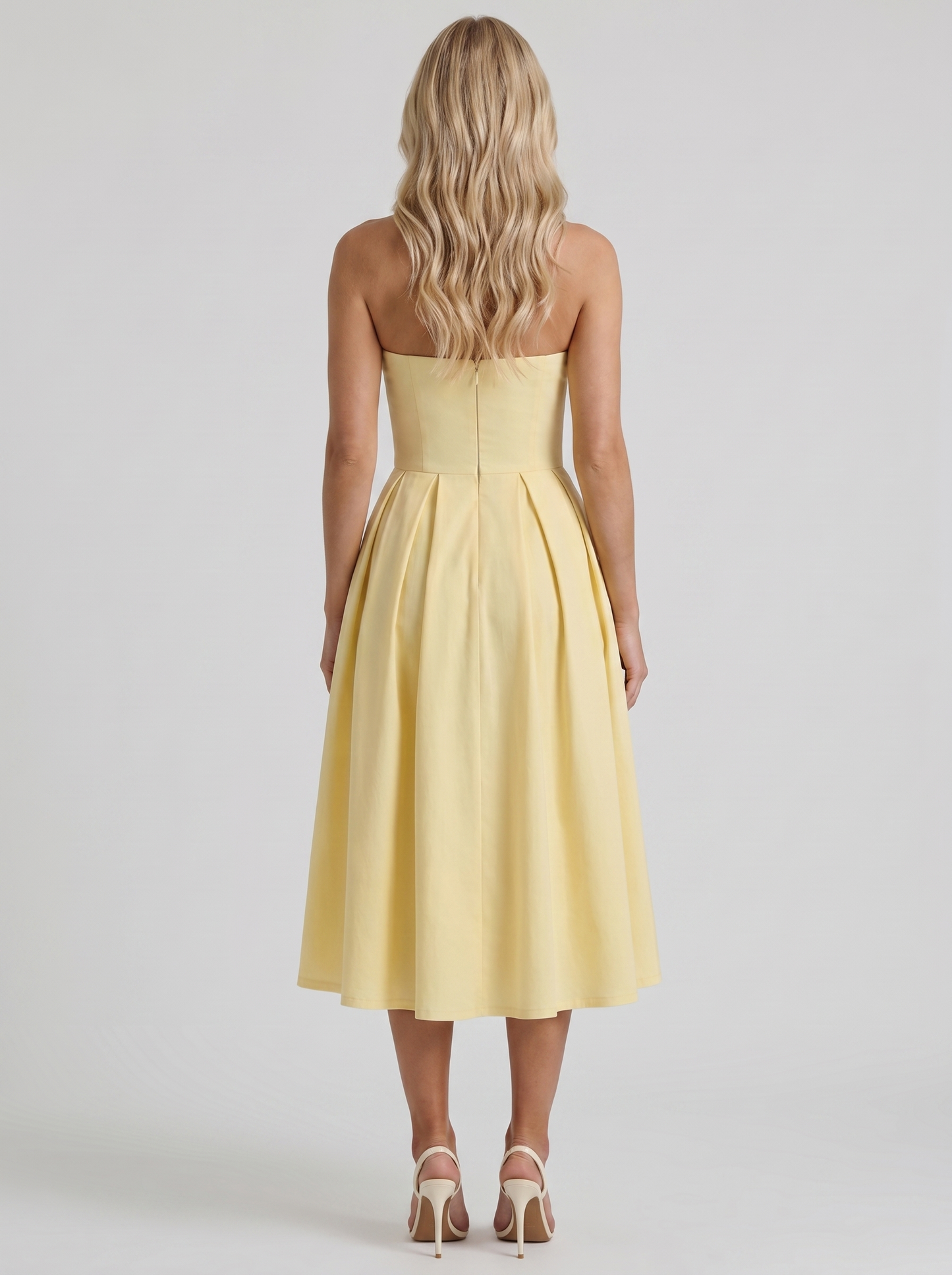 Women lemon strapless pleated midi dress with open back, back view