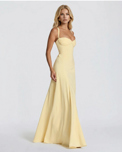 Women yellow corset maxi dress with structured bodice and thin straps, front cropped view