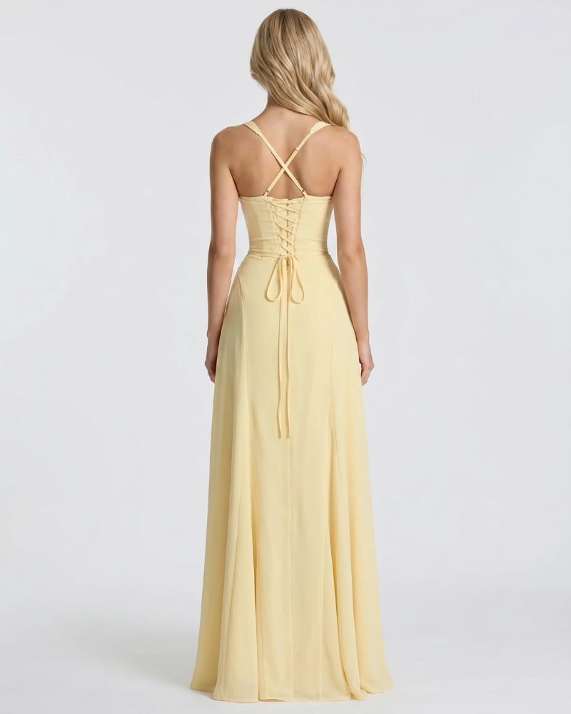 Women yellow corset maxi dress with mermaid silhouette and floor length hem, 45 degree angle