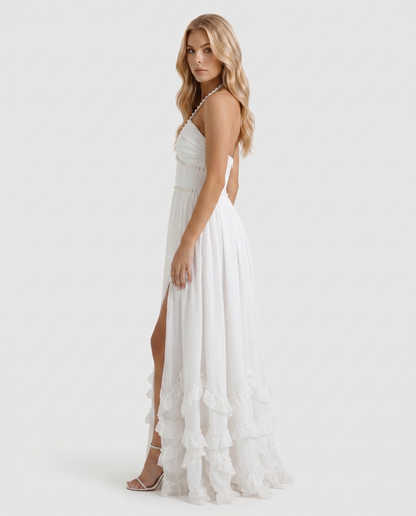 Women powder bloom halter maxi dress with empire waist and ruffle skirt, 45 degree angle