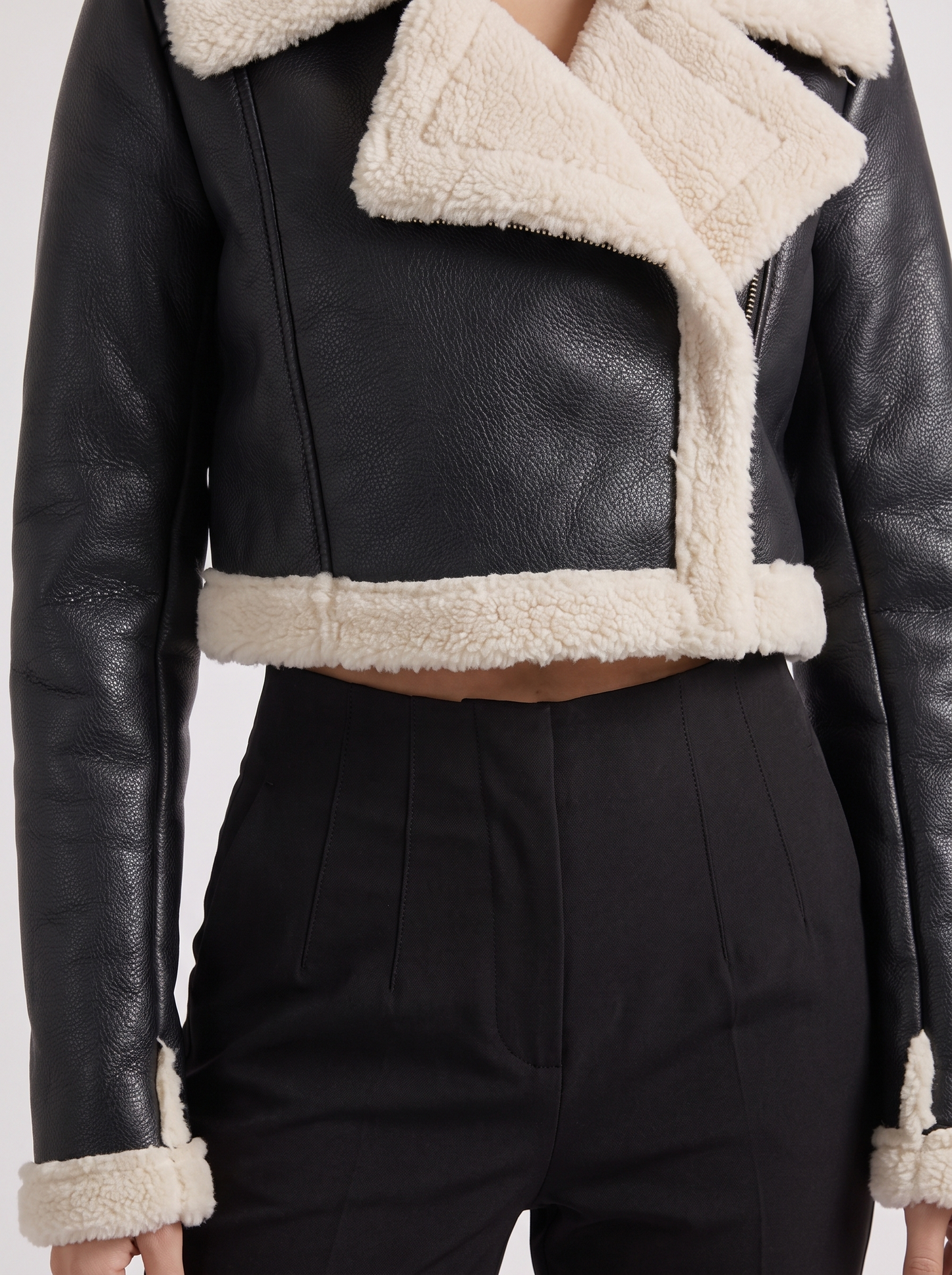 Women's black aviator jacket with fleece collar and cropped length