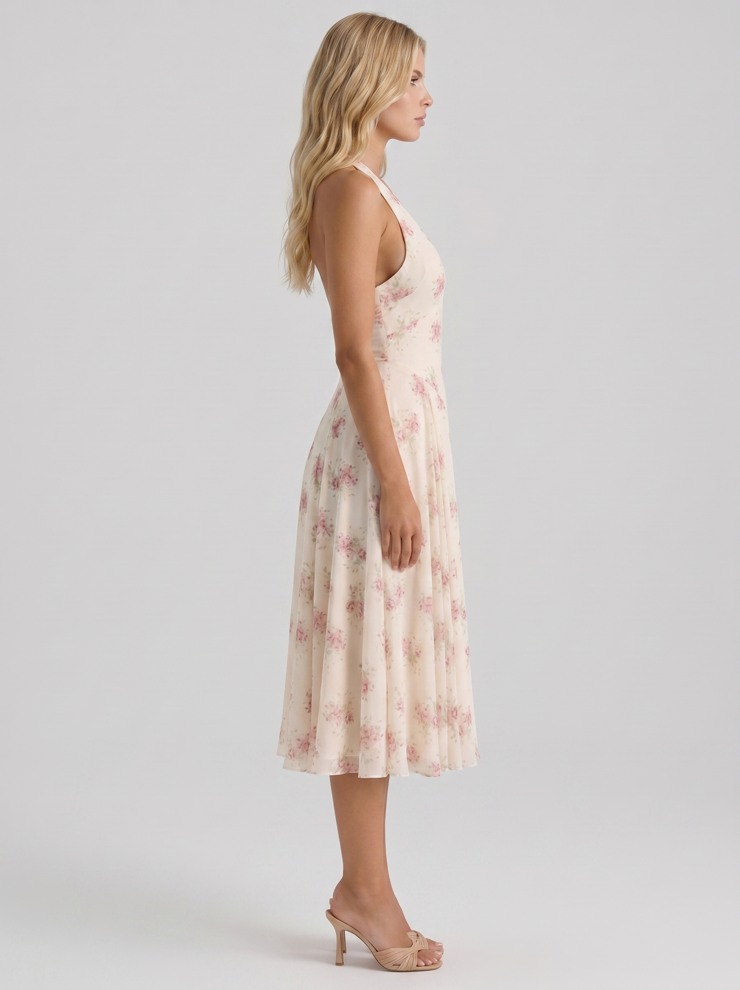 Women cream pink floral halter georgette midi dress, side profile view